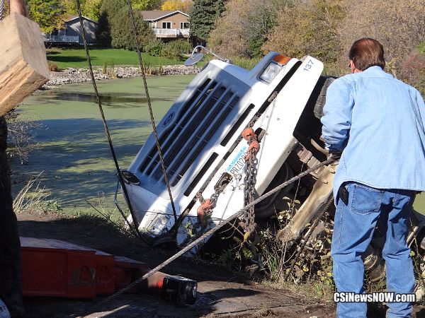Truck pulled from river - More CSiNewsNow.com photos @ Facebook